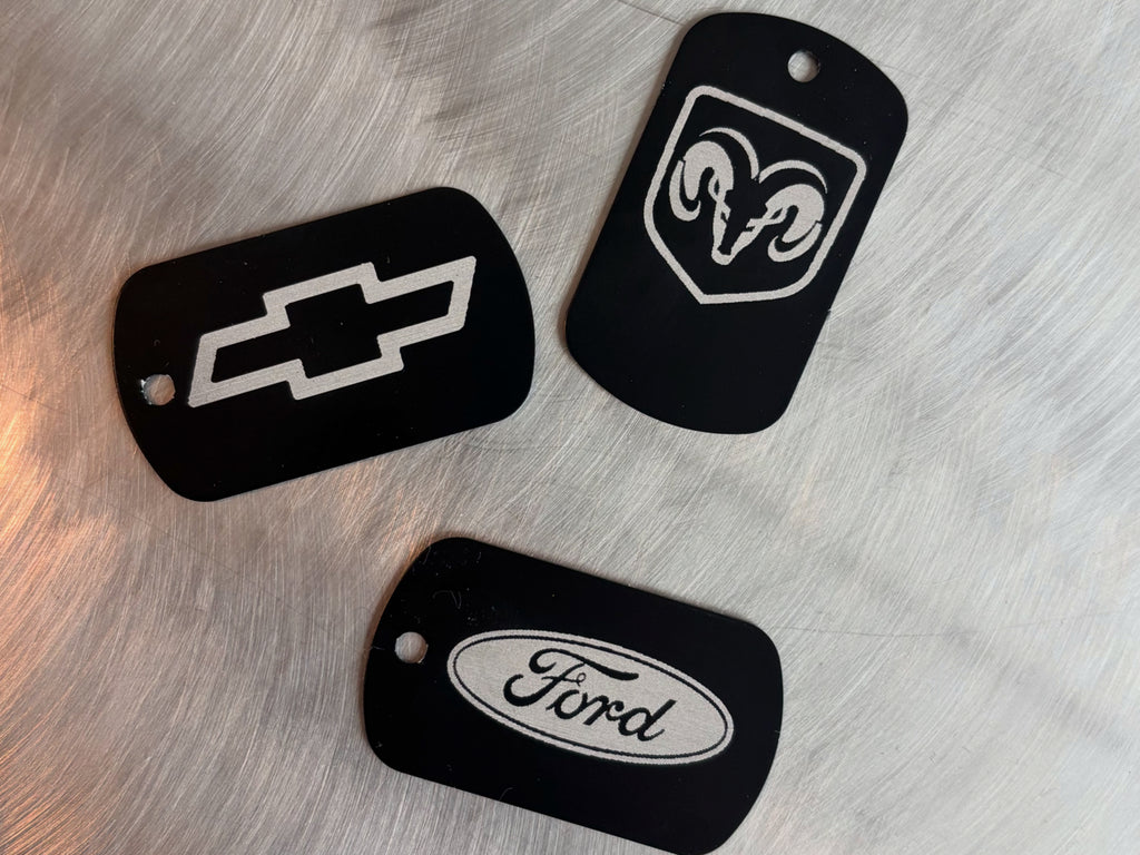 50 aluminum tags, black anodized, 2" X 1", dog tag style, laser engraved, 1 side, 1 hole